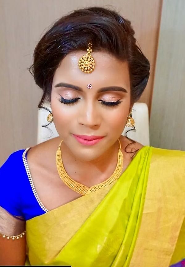 South Indian bridal makeup with temple jewellery and silk saree